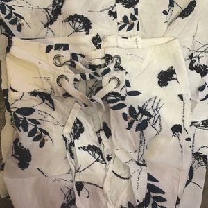 White lace up breezy floral flare pants
